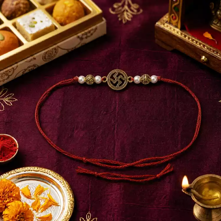 Buy Swastik Oval Rakhi Online for Brother